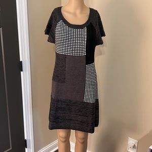 Short-sleeve knit sweater dress.